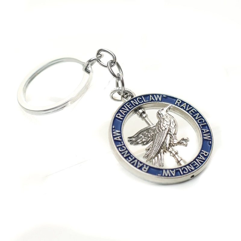 Harry potter llavero metal hogwarts ( se gira )