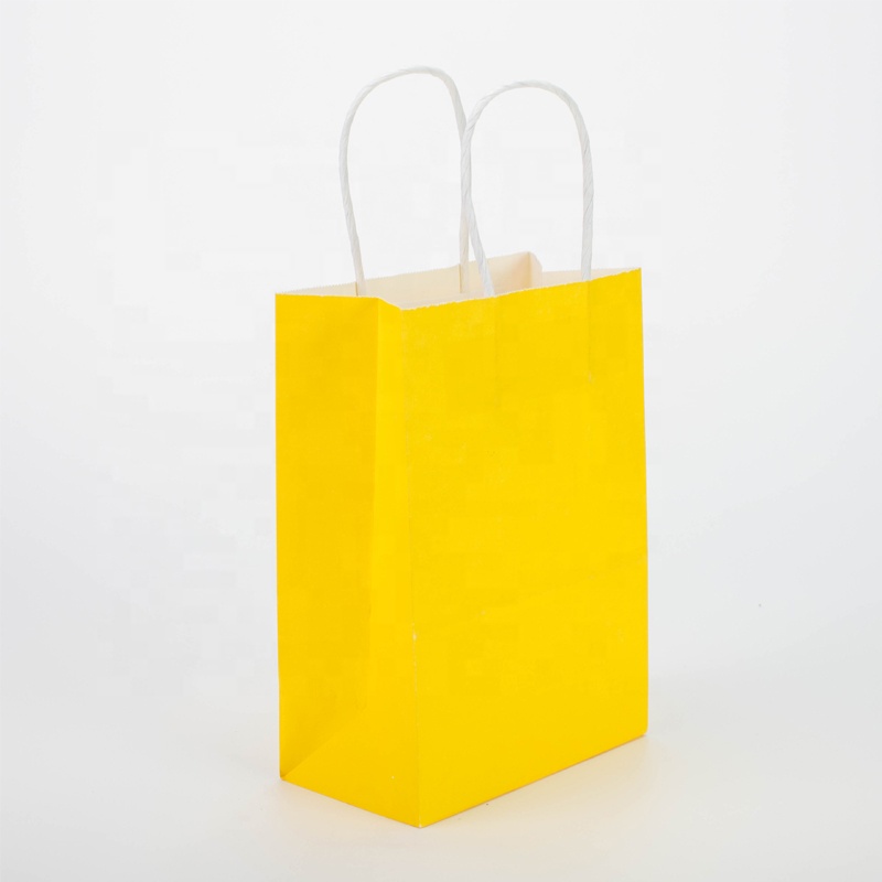 Bolsa papel manija color amarillo  18 x 20